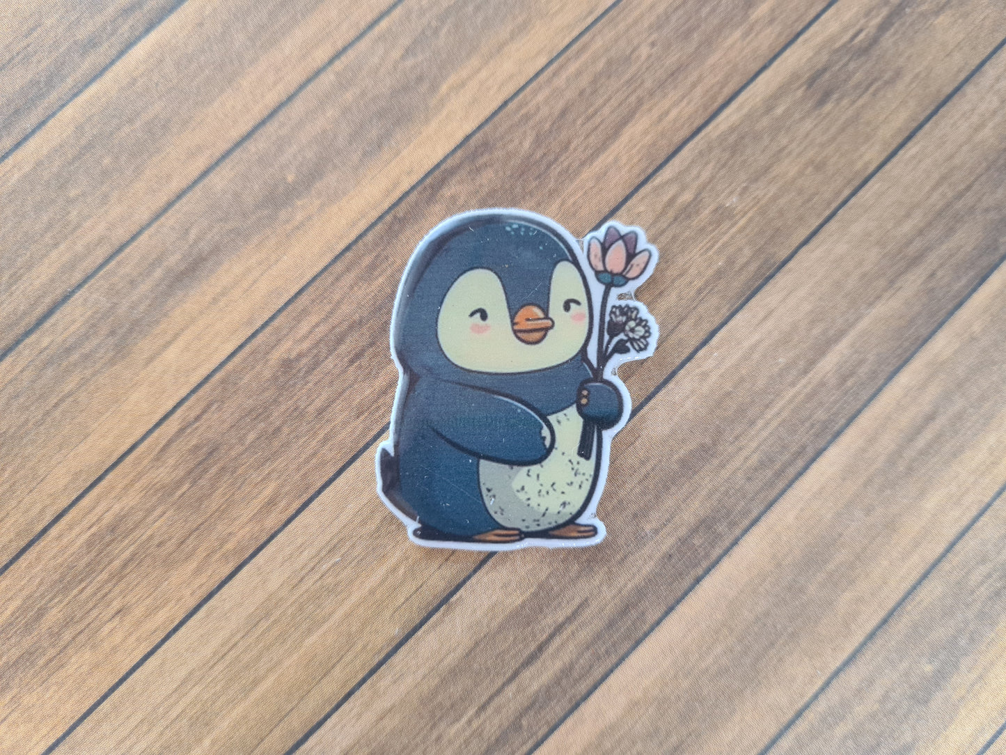 Pinguin mit Blümchen
